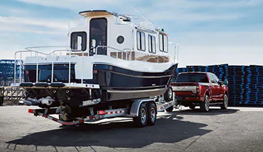 2022 Nissan TITAN Truck towing boat | Redwood City Nissan in Redwood City CA