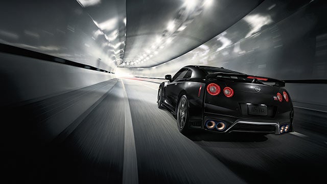2023 Nissan GT-R seen from behind driving through a tunnel | Redwood City Nissan in Redwood City CA